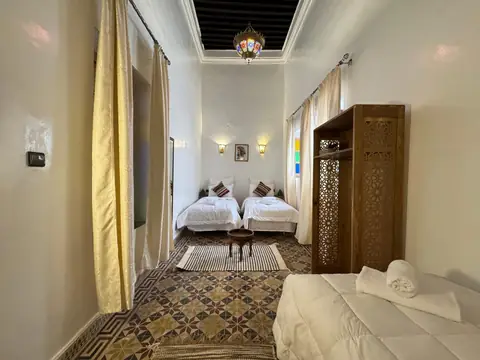 La chambre triple, vue de la porte