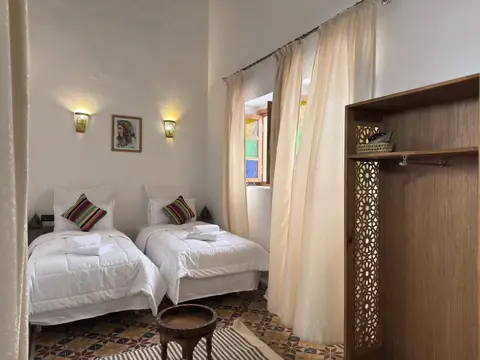 La chambre triple, côté fenêtre
