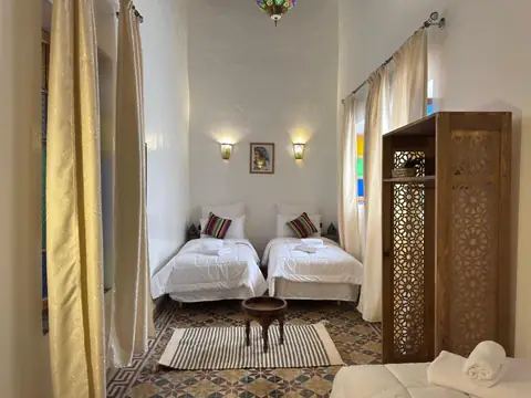 Les lits de la chambre triple
